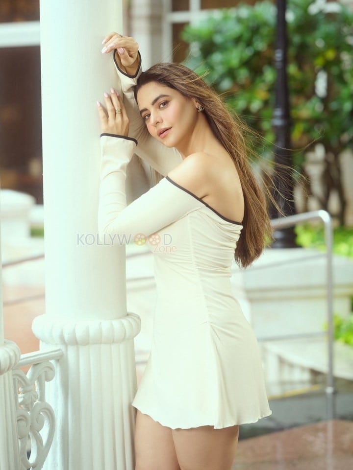Graceful Aamna Sharif in a White Off Shoulder Mini Dress Photos 06