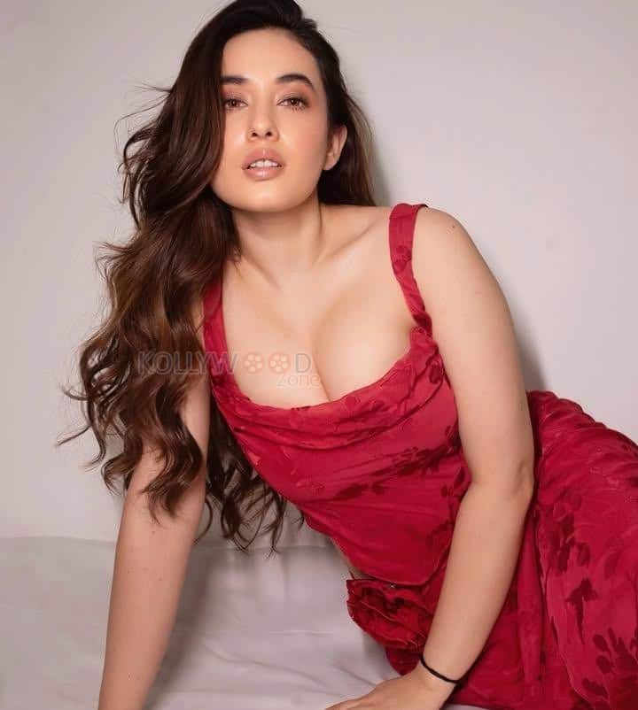 Nepali Actress Aditi Budhathoki Cleavage in a Red Sleeveless Bodycon Dress Pictures 01