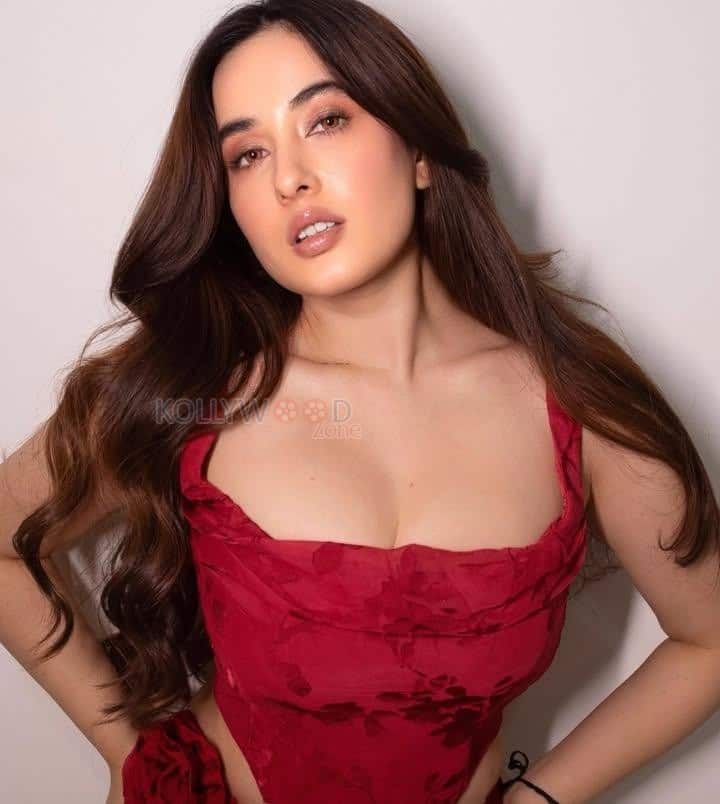 Nepali Actress Aditi Budhathoki Cleavage in a Red Sleeveless Bodycon Dress Pictures 02
