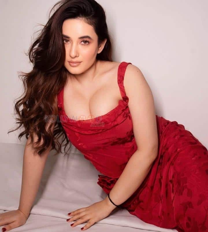 Nepali Actress Aditi Budhathoki Cleavage in a Red Sleeveless Bodycon Dress Pictures 03