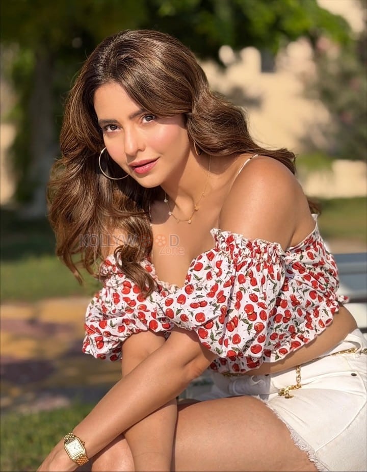 Sexy Aamna Sharif in an Off Shoulder Red Cherry Printed Crop Top with a White Denim Shorts Pictures 02