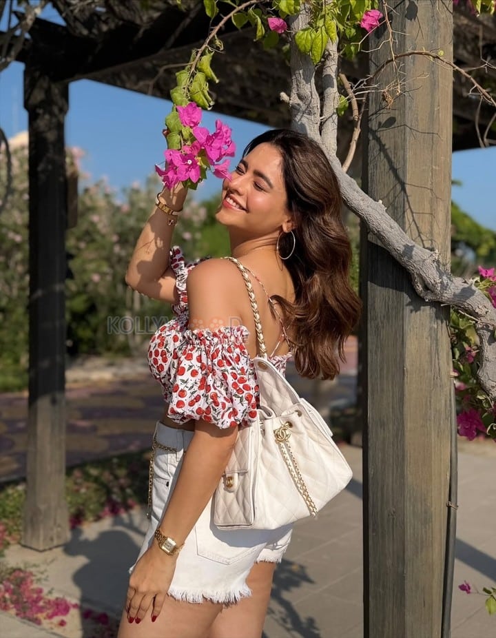 Sexy Aamna Sharif in an Off Shoulder Red Cherry Printed Crop Top with a White Denim Shorts Pictures 03