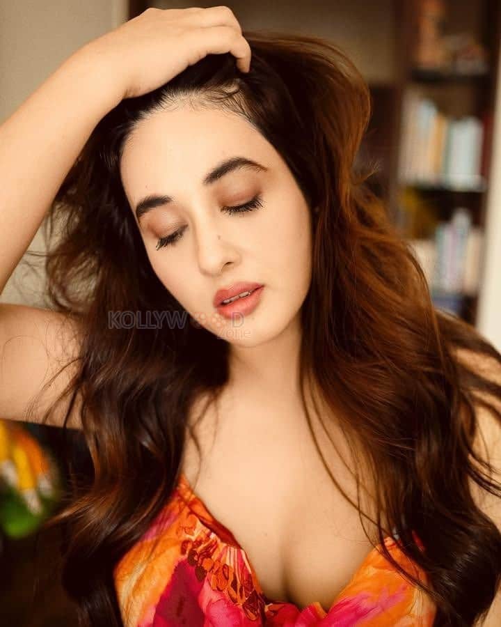 Sexy Nepali Model Aditi Budhathoki in an Orange and Blue Sleeveless Midi Dress Photos 02
