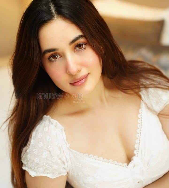 Stunning Aditi Budhathoki Cleavage in a Lace White Dress Photos 02