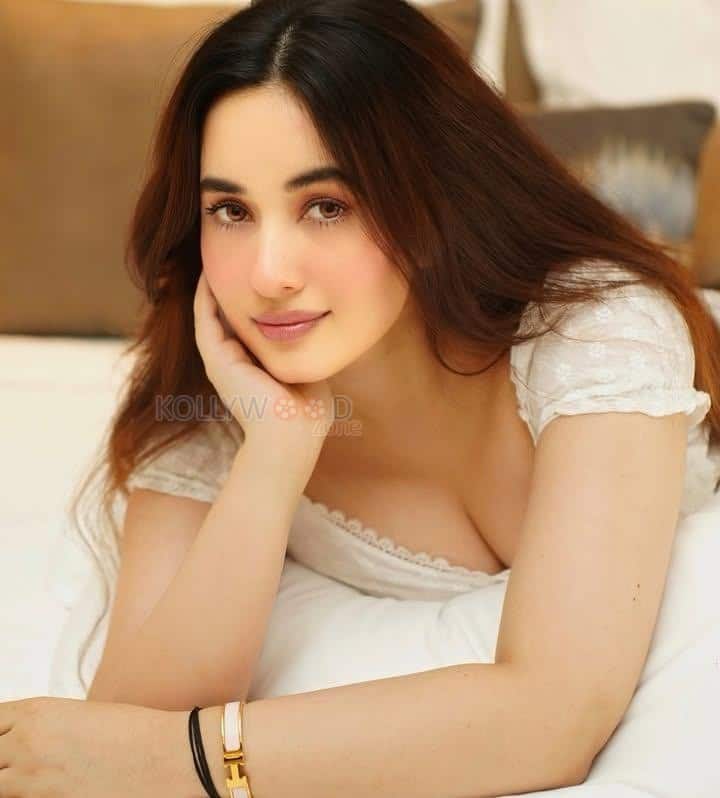 Stunning Aditi Budhathoki Cleavage in a Lace White Dress Photos 03