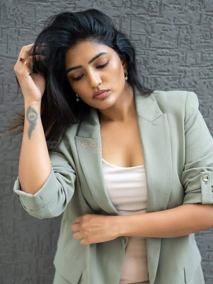 Stunning Telugu Beauty Eesha Rebba in a White Top and Light Green Blazer Pictures 02