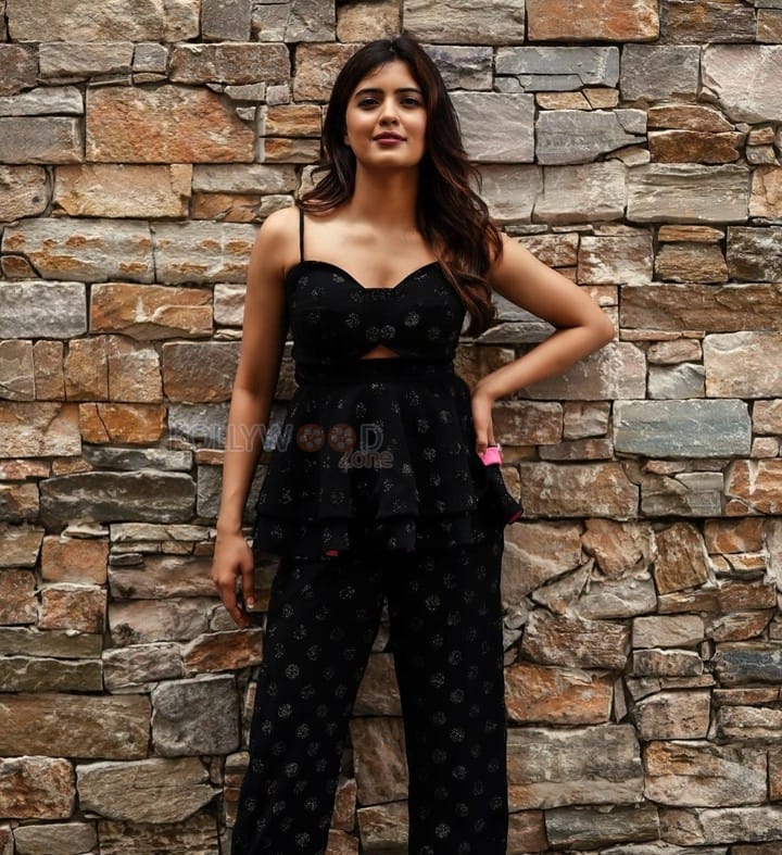 Stylish Amritha Aiyer in a Black Printed Dress Photos 01
