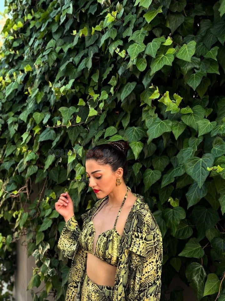 Bold Mehreen Pirzada in a Yellow and Black Halter Top and Shorts with a Loose Skirt Pictures 07