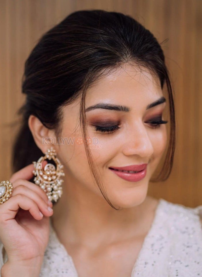 Cute Mehreen Pirzada in a White Lace Dress Pictures 01