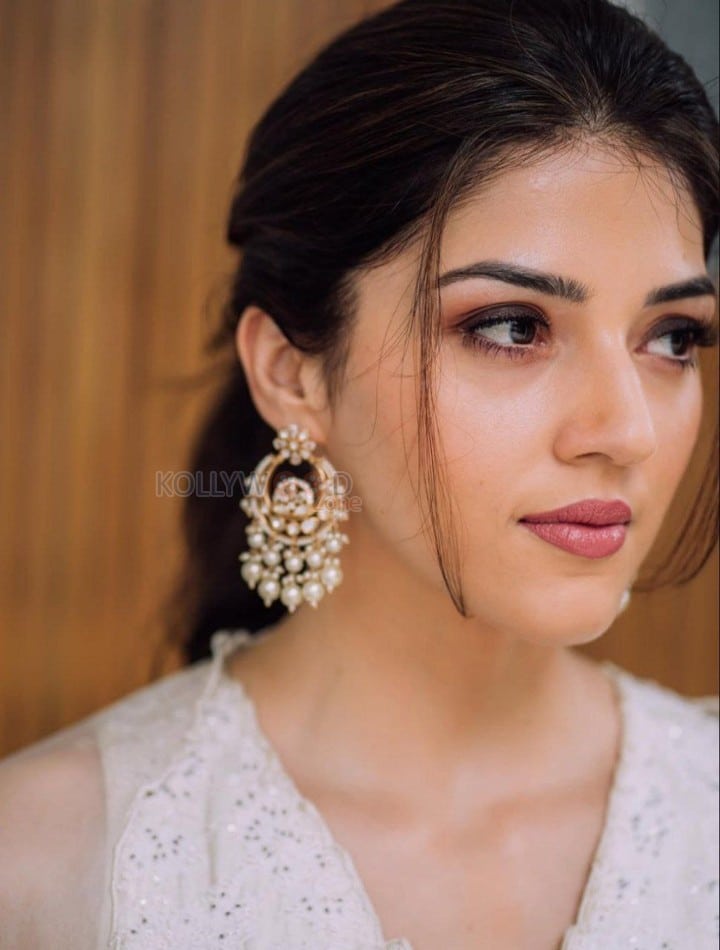 Cute Mehreen Pirzada in a White Lace Dress Pictures 02