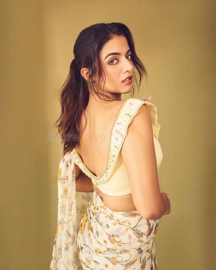 Graceful Wamiqa Gabbi in a Pastel Floral Saree with a Ruffled Off Shoulder Blouse Pictures 01