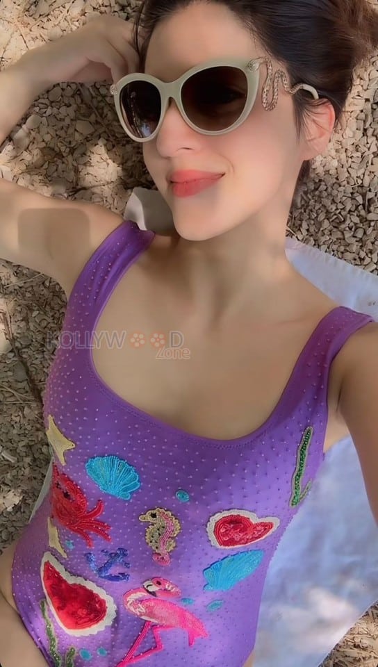 Sexy Mehreen Pirzada in a Blue Swimsuit Vacation Pictures 04