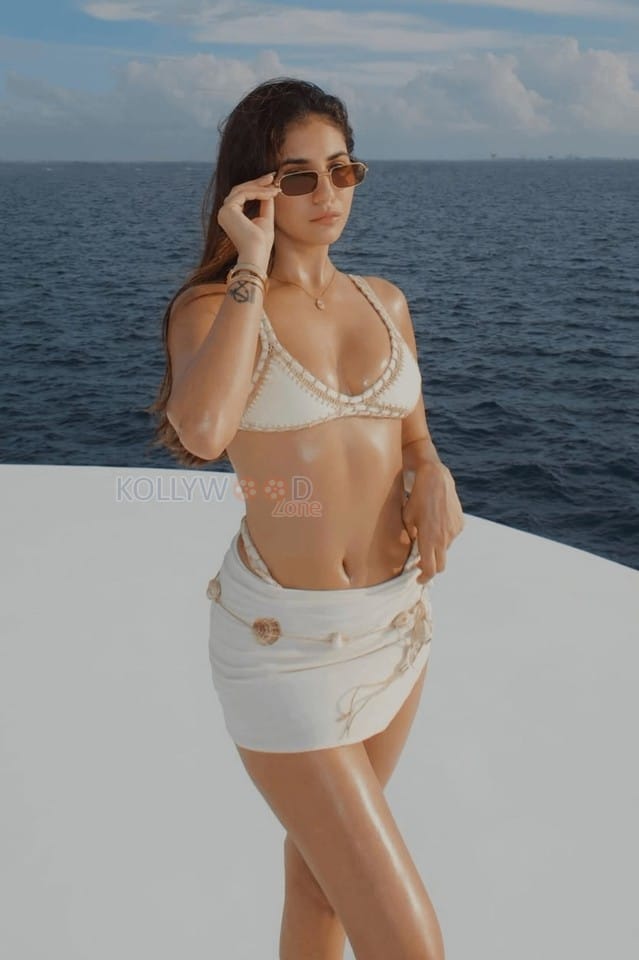 Stunning Radhika Seth in a White Beach Bikini Pictures 01