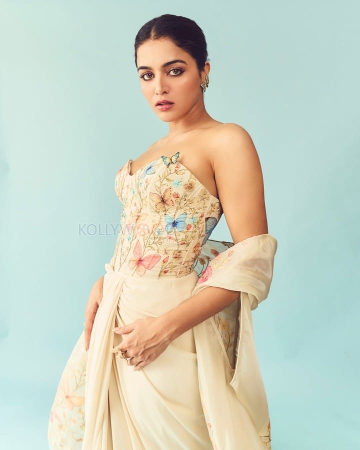 Stunning Wamiqa Gabbi in an Off Shoulder Pastel Embroidered Floral Butterfly Dress Pictures 06