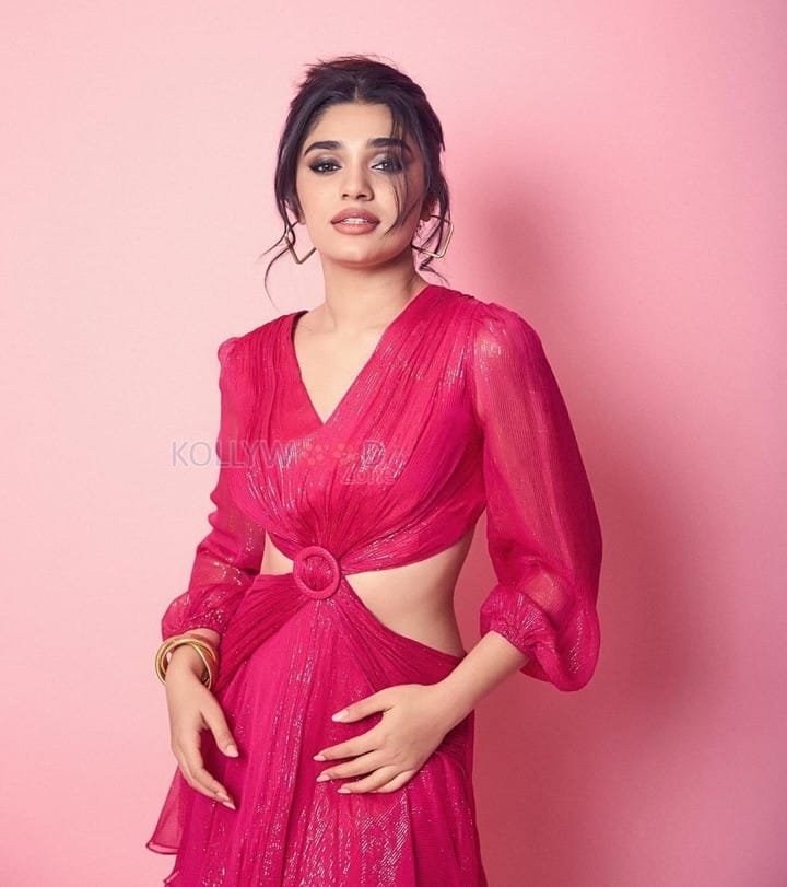 Adorable Krithi Shetty in a Pink Cut Out Thigh Slit Dress Photos 01