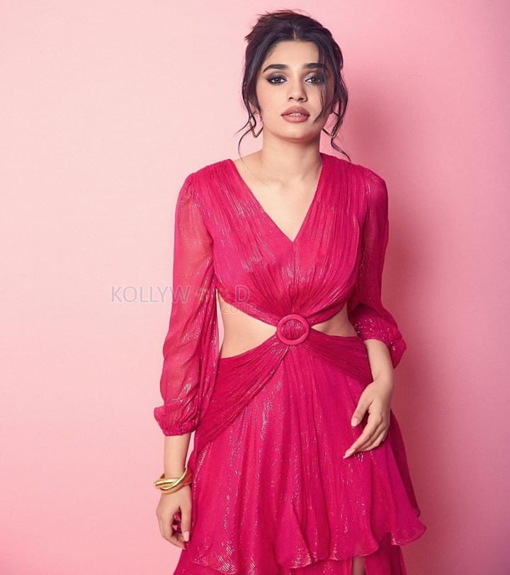 Adorable Krithi Shetty in a Pink Cut Out Thigh Slit Dress Photos 03