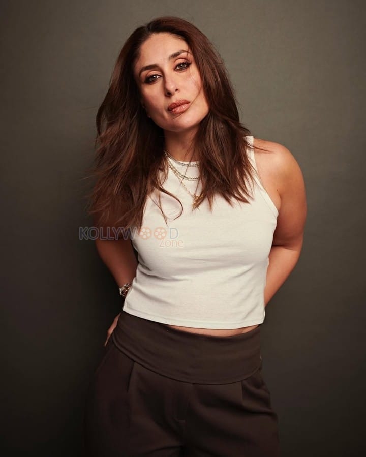 Bollywood Diva Kareena Kapoor Khan in a White Tank Top and Dark Brown High Waist Pants Photos 02