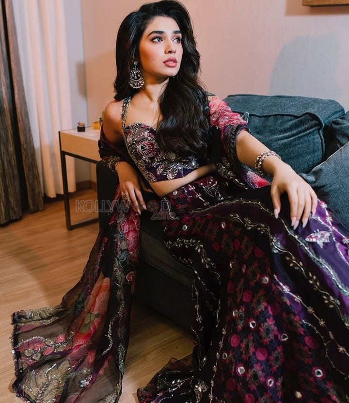 Elegant Krithi Shetty in a Purple Embroidered Lehenga with a Corset Style Top Photos 01