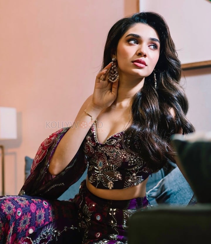 Elegant Krithi Shetty in a Purple Embroidered Lehenga with a Corset Style Top Photos 02