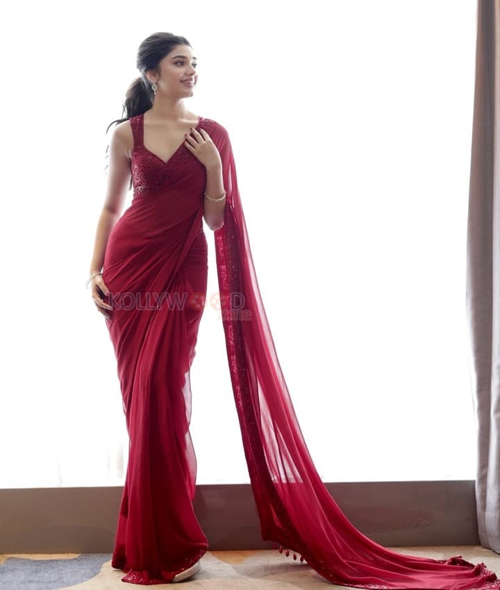 Love Insurance Kompany Heroine Krithi Shetty in a Red Saree with Sleeveless Blouse Photos 01