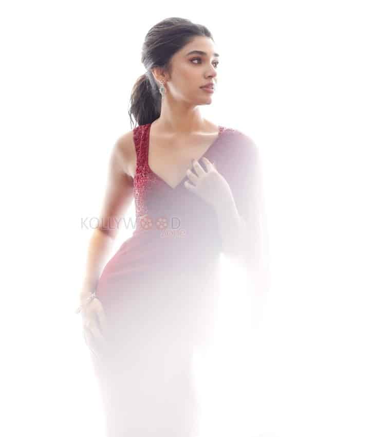 Love Insurance Kompany Heroine Krithi Shetty in a Red Saree with Sleeveless Blouse Photos 05
