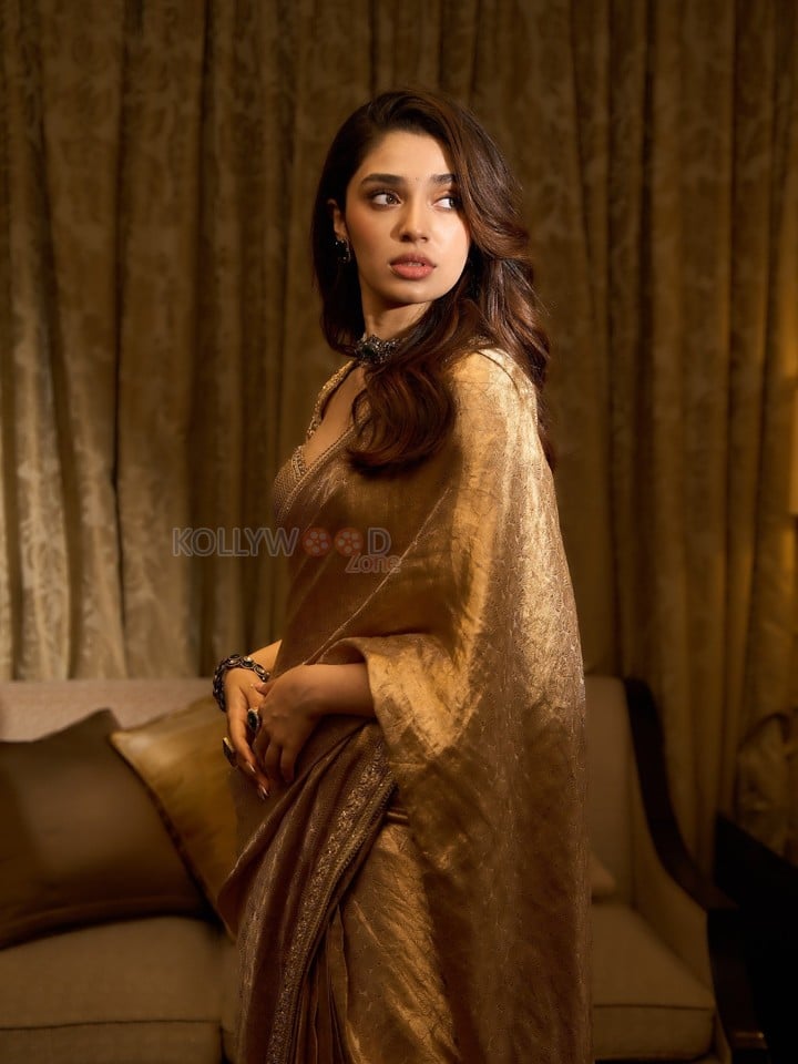Mesmerizing Krithi Shetty in a Golden Saree with a Designer Saree Photos 06