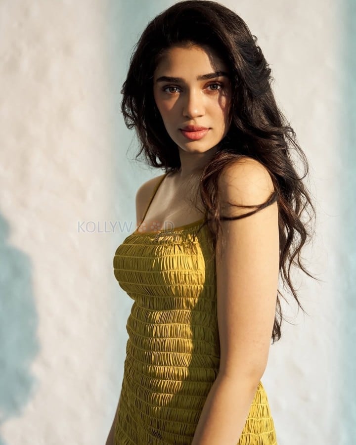 Ravishing Beauty Krithi Shetty in a Single Strap Golden Bodycon Dress Photos 04