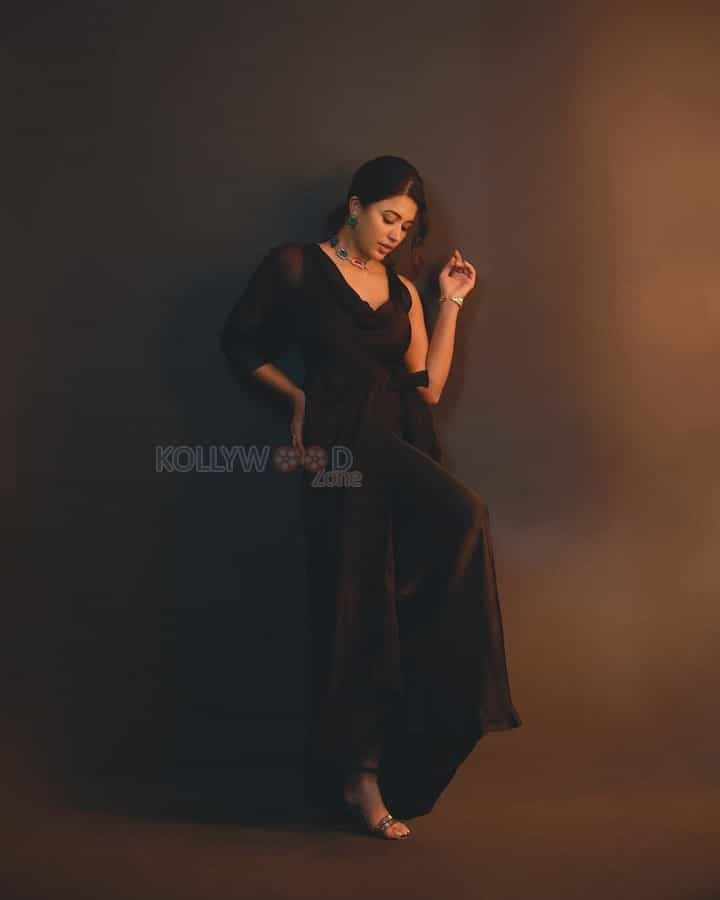 Sexy Anju Kurian in a Black Maxi Dress Photos 01