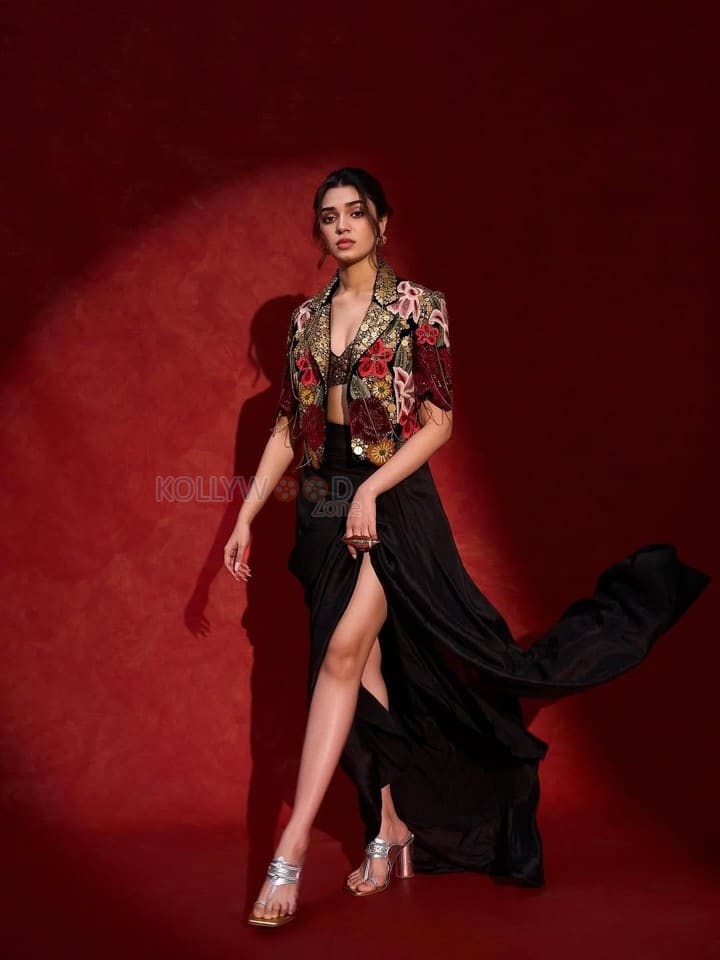 Stunningly Attractive Krithi Shetty in a Black Velvet Embroidered Crop Blazer with a Silk Embroidered Bustier and Thigh Slit Drape Skirt Photos 03