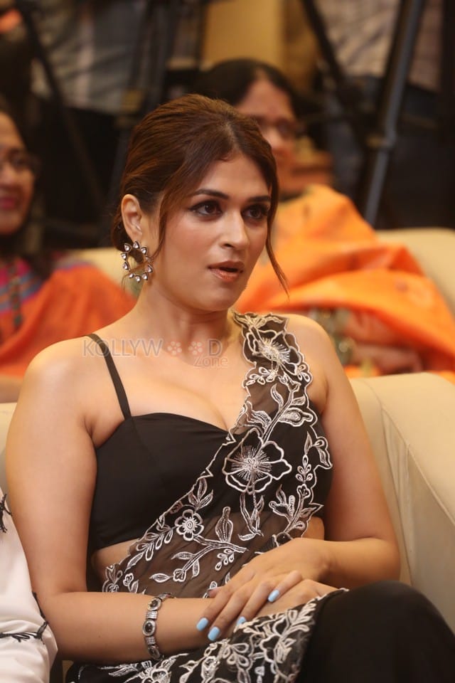 Actress Shraddha Das at Paarijatha Parvam Movie Pre Release Event Photos 18