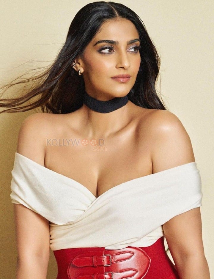 Actress Sonam Kapoor Showing Cleavage in a White Off Shoulder Dress Pictures 01