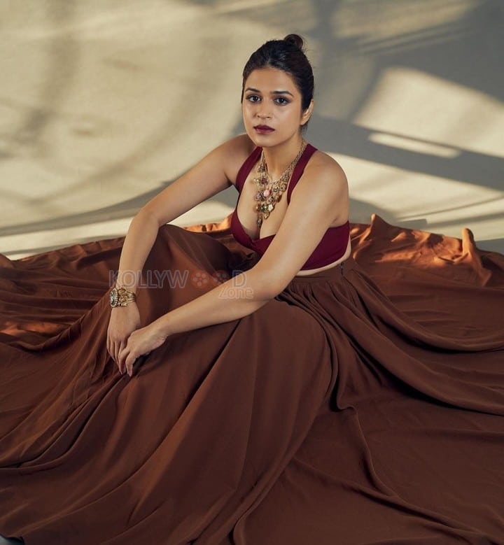 Beautiful Actress Shraddha Das in a Brown Lehenga Choli Photos 02