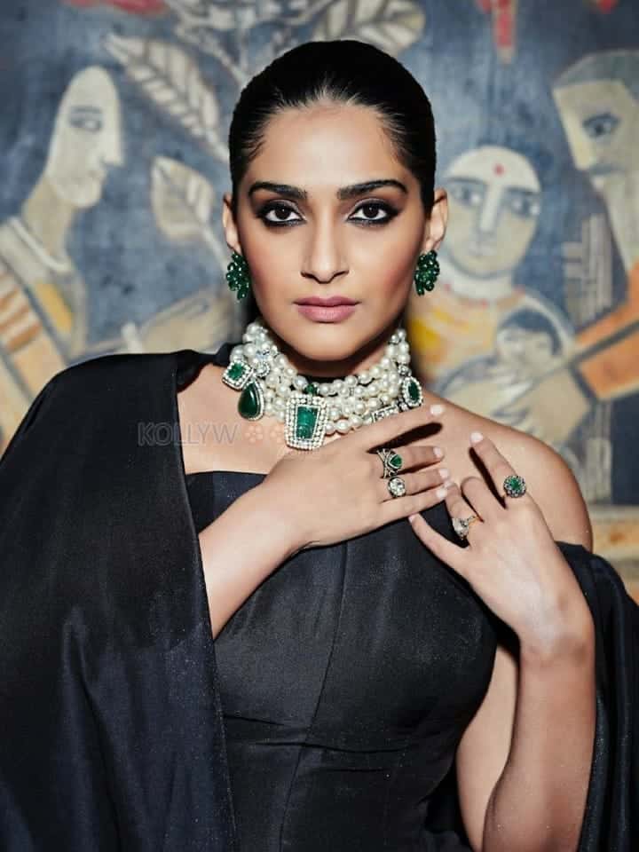 Fashion Diva Sonam Kapoor in a Black Dress Photos 02