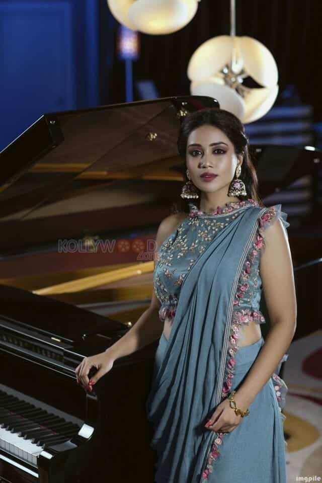 Nivetha Pethuraj Standing Near a Piano Photo 01