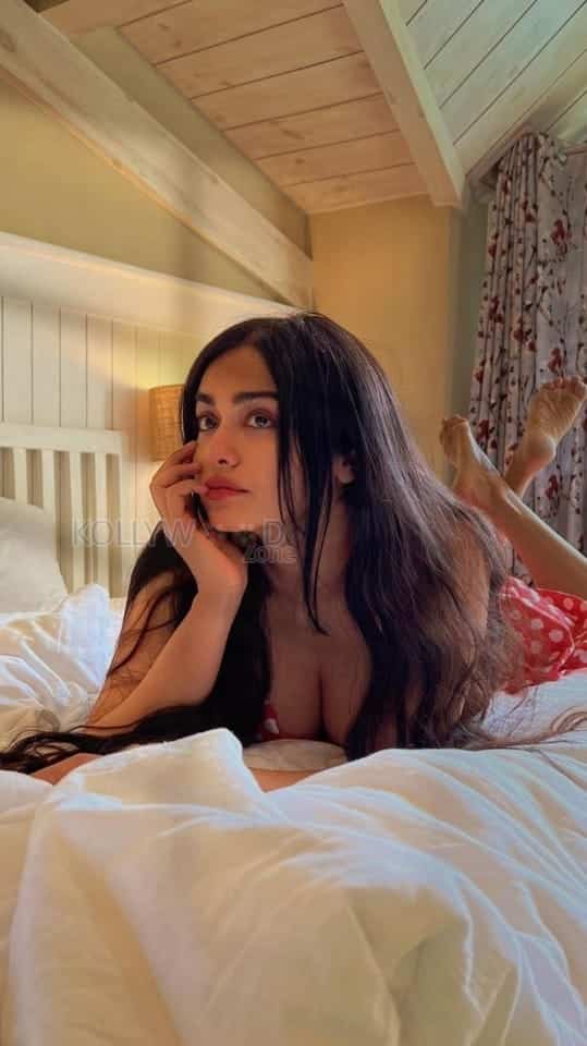 Seductive Adah Sharma on the Bed and Showing Cleavage Photos 01