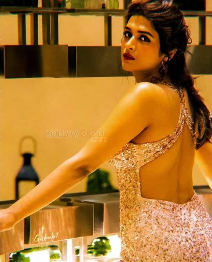 Sexy Actress Shraddha Das in a Glittering Dress Photos 01
