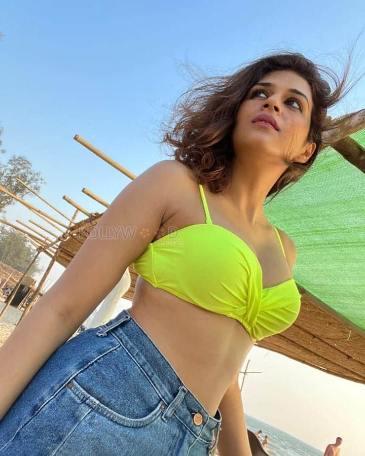 Sexy Bombshell Shraddha Das in a Neon Bikini Photos 03