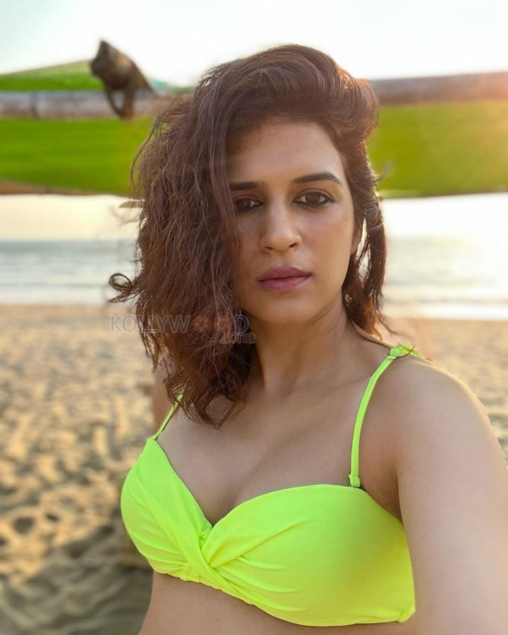 Sexy Bombshell Shraddha Das in a Neon Bikini Photos 07
