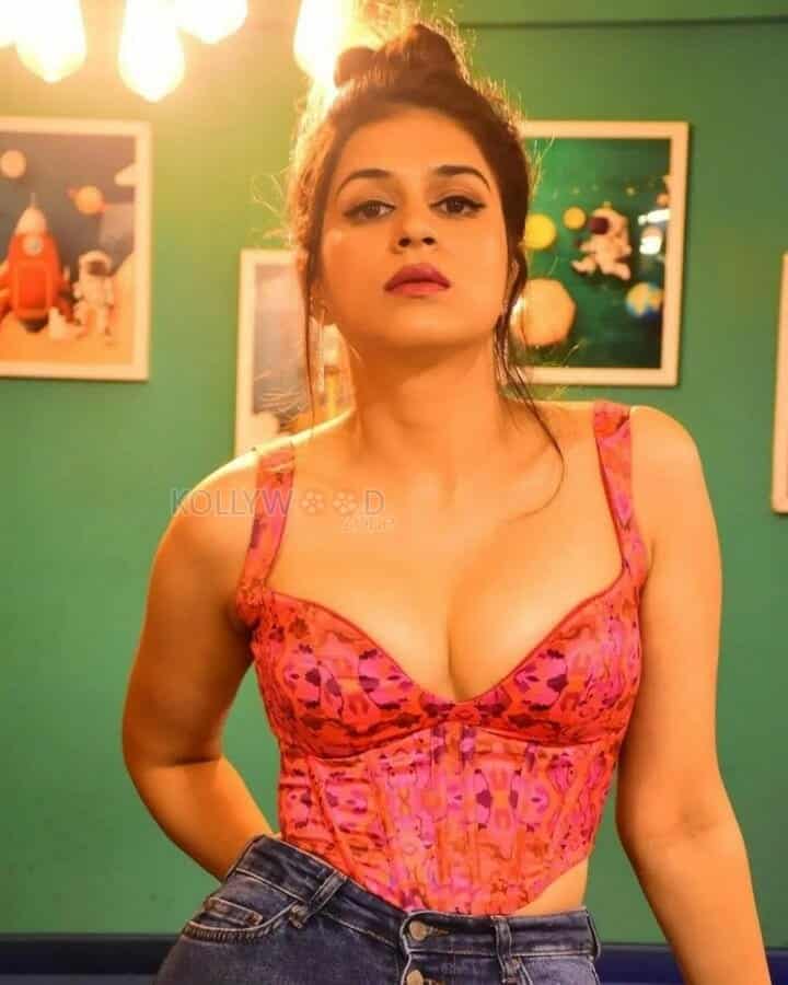 Sexy Shraddha Das Standing Near a Pool Table and Showing Hot Cleavage Photos 03