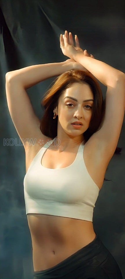 Stunning Hot Sandeepa Dhar in a White Sports Bra and Black Pants Pictures 01