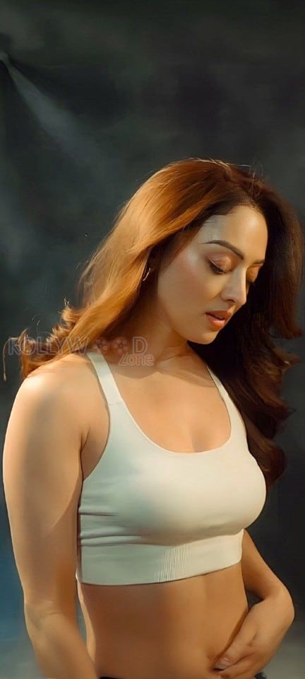 Stunning Hot Sandeepa Dhar in a White Sports Bra and Black Pants Pictures 02