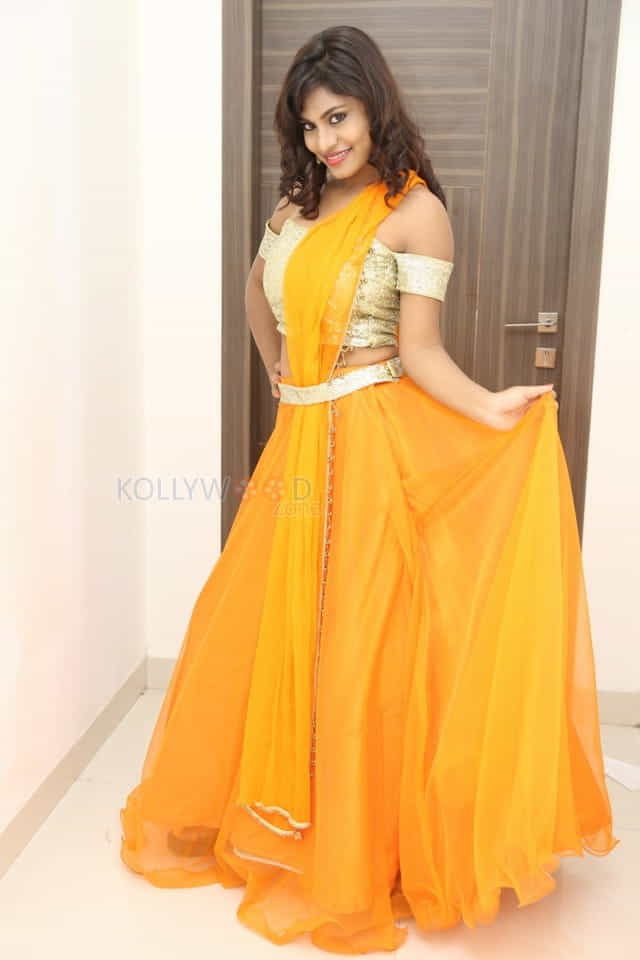 Actress Priyanka Augustin At Runam Audio Launch Photos 02