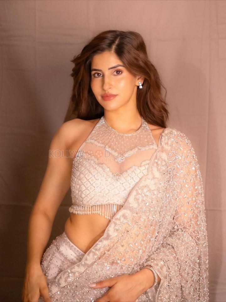 Dazzling Sakshi Malik in a White Embellished Saree with a Halter Neck Blouse Photos 02
