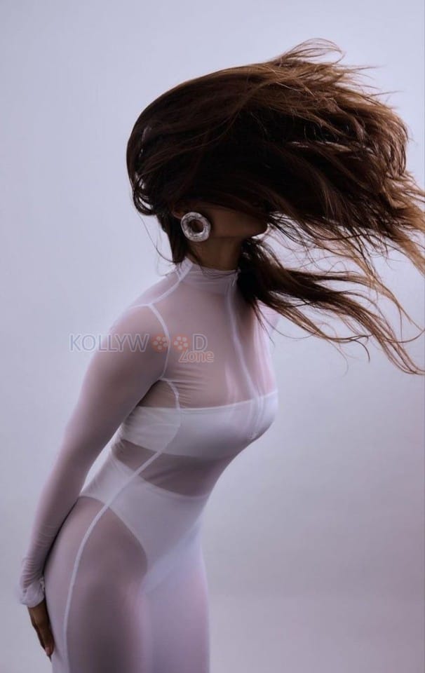 Enchanting Sonam Bajwa in a White See through Gown with White Bikini Underneath Photos 01