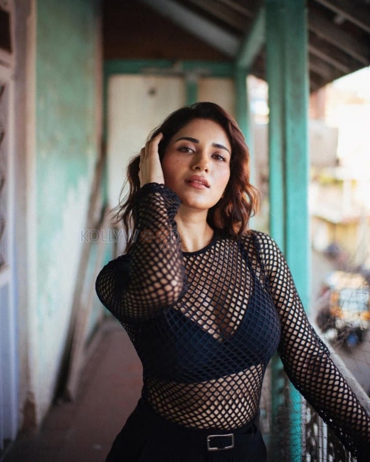 Gorgeous Ruhani Sharma in a Mesh Top and Black Bra Photos 02