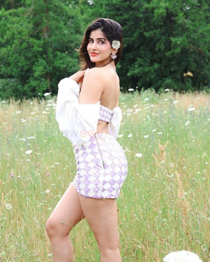 Hot and Sexy Sakshi Malik in a Lilac Off Shoulder Top with a Mini Skirt Photos 04