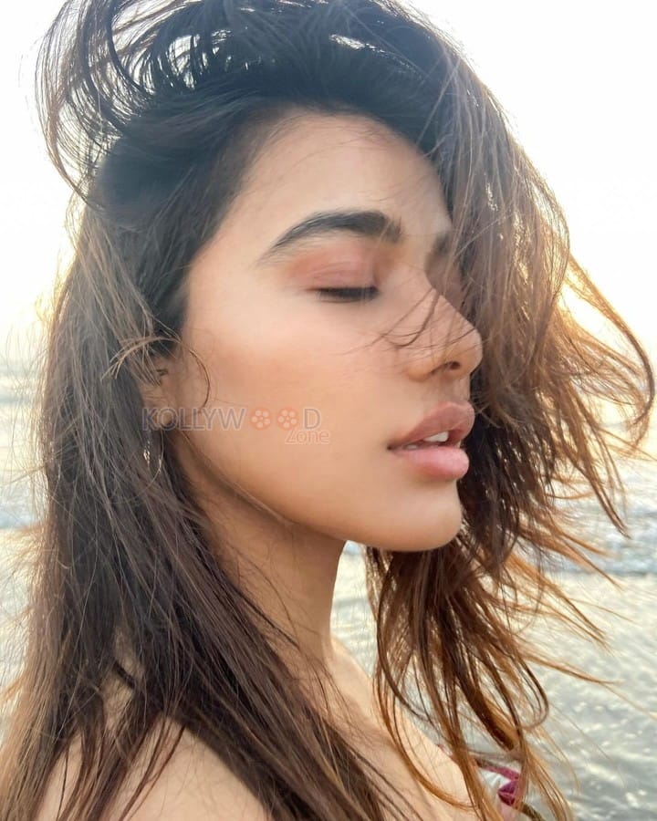 Ravishing Ketika Sharma in a Sleeveless Tube Top and Mini Skirt at the Beach Photos 02