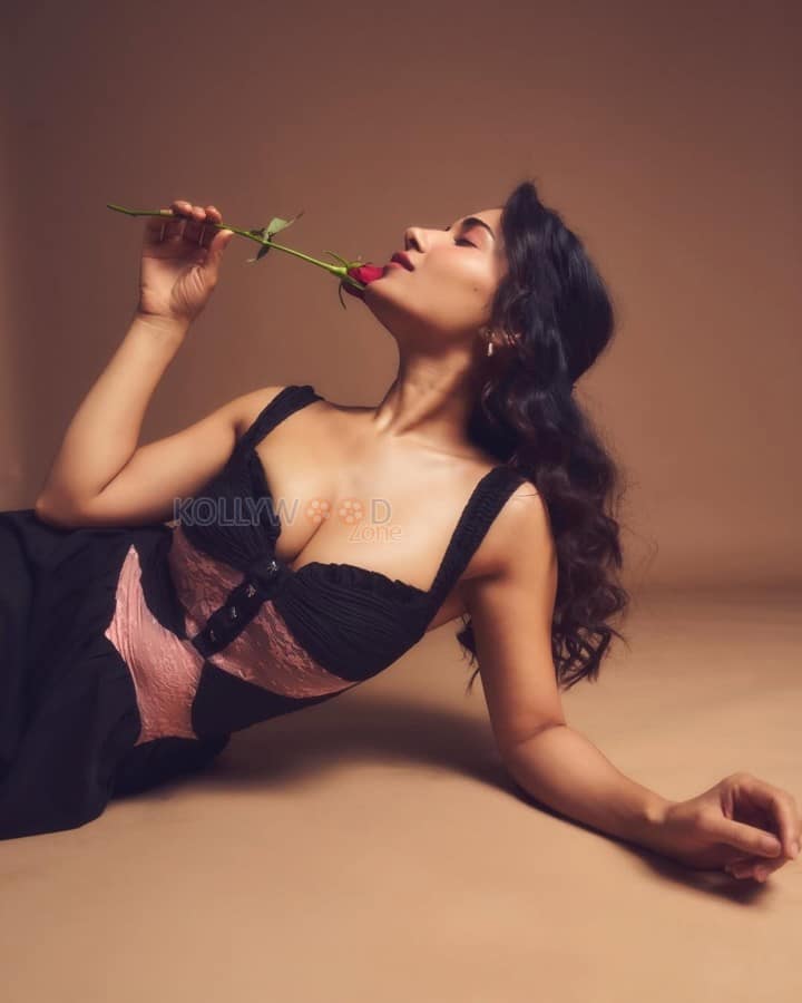 Sensual Ruhani Sharma in a Black Strappy Gown with a Red Rose Pictures 02