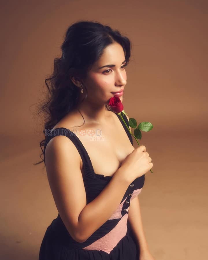 Sensual Ruhani Sharma in a Black Strappy Gown with a Red Rose Pictures 04