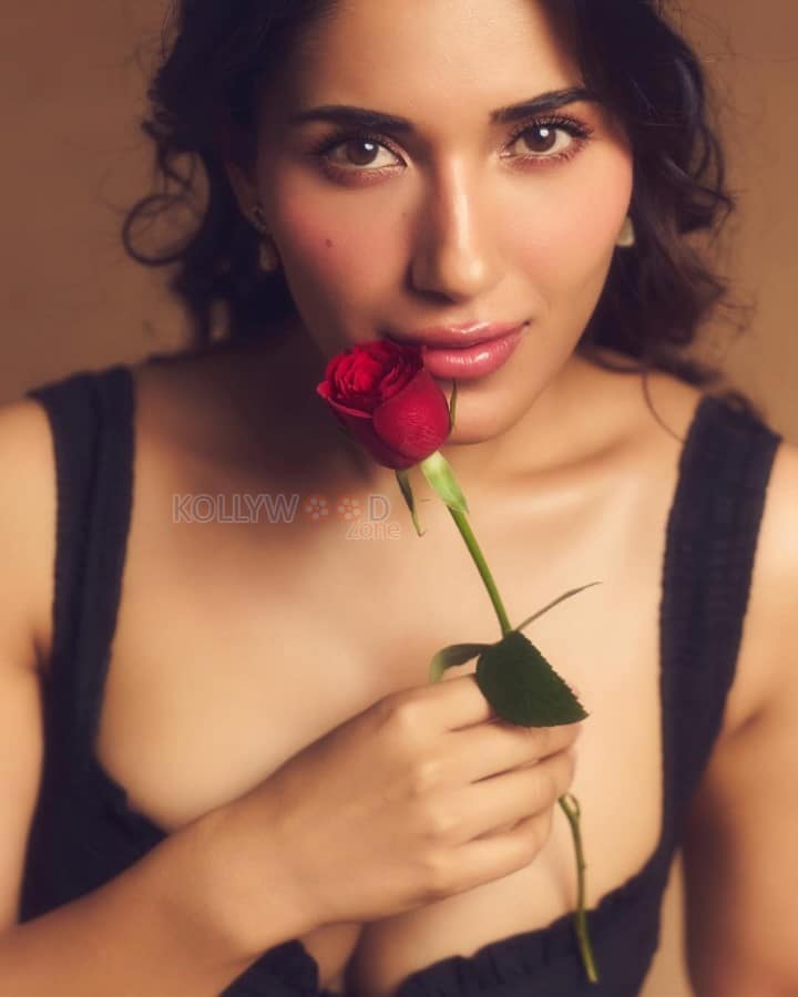 Sensual Ruhani Sharma in a Black Strappy Gown with a Red Rose Pictures 05